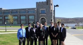 Photo of students on campus in front of building